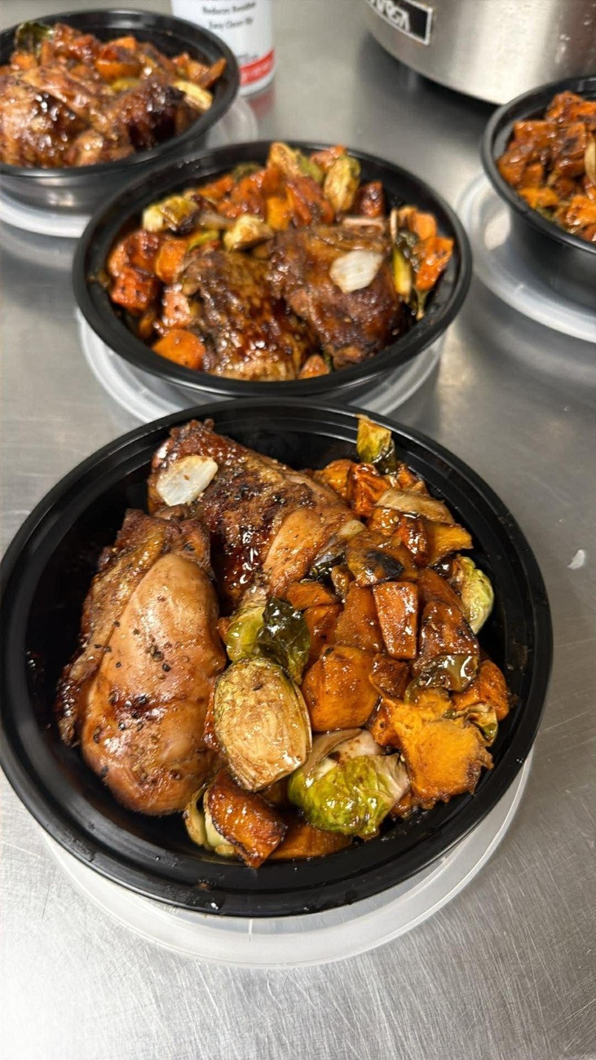 Prepared chicken meals with roasted vegetables